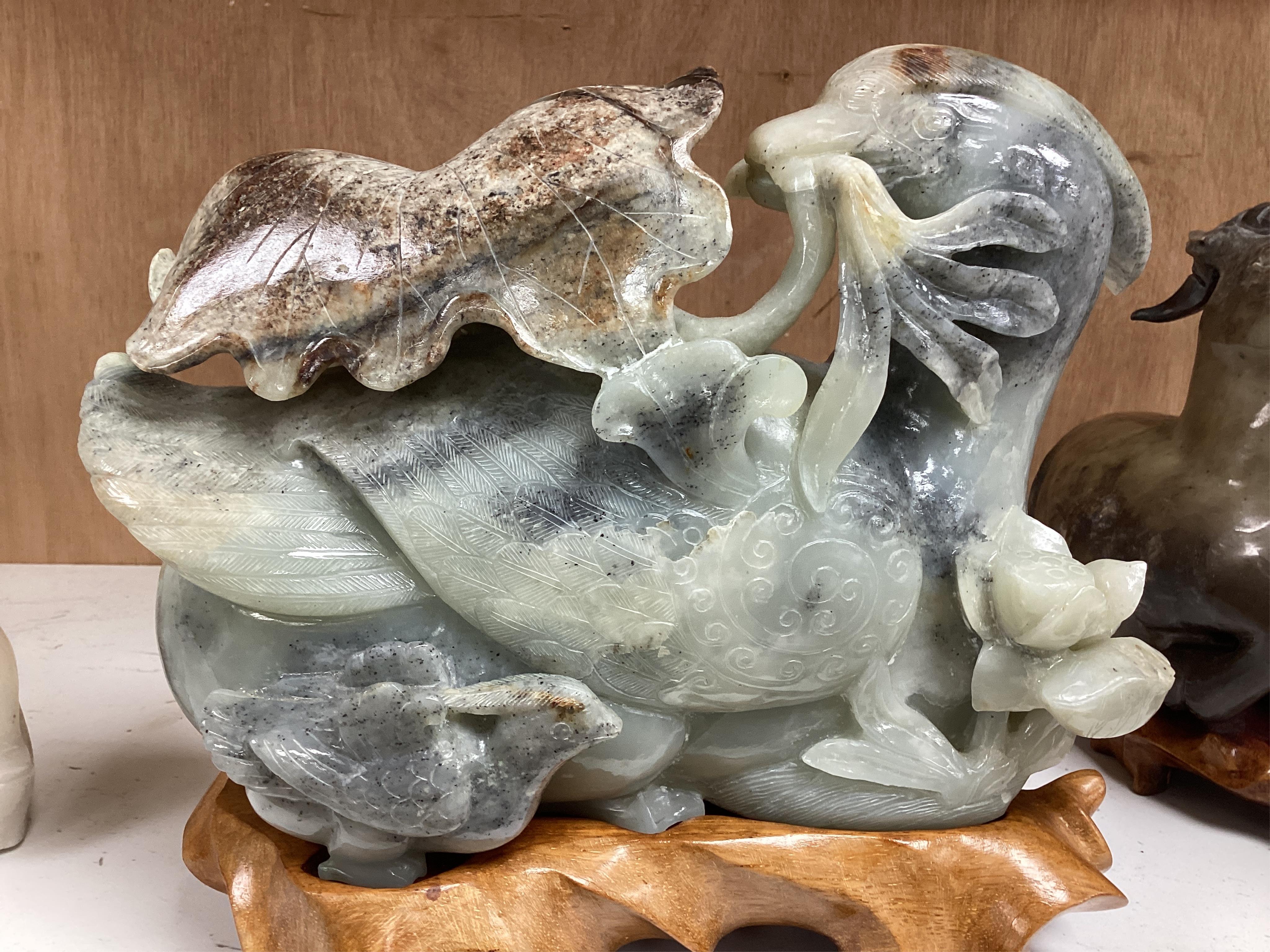Two modern jade figures, together with a marble Buddha and a carved giltwood figure, largest 24cm wide
